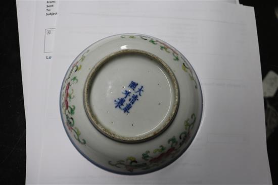 A Chinese wucai dragon and phoenix saucer dish, Kangxi mark, 19th century diameter 13.5cm